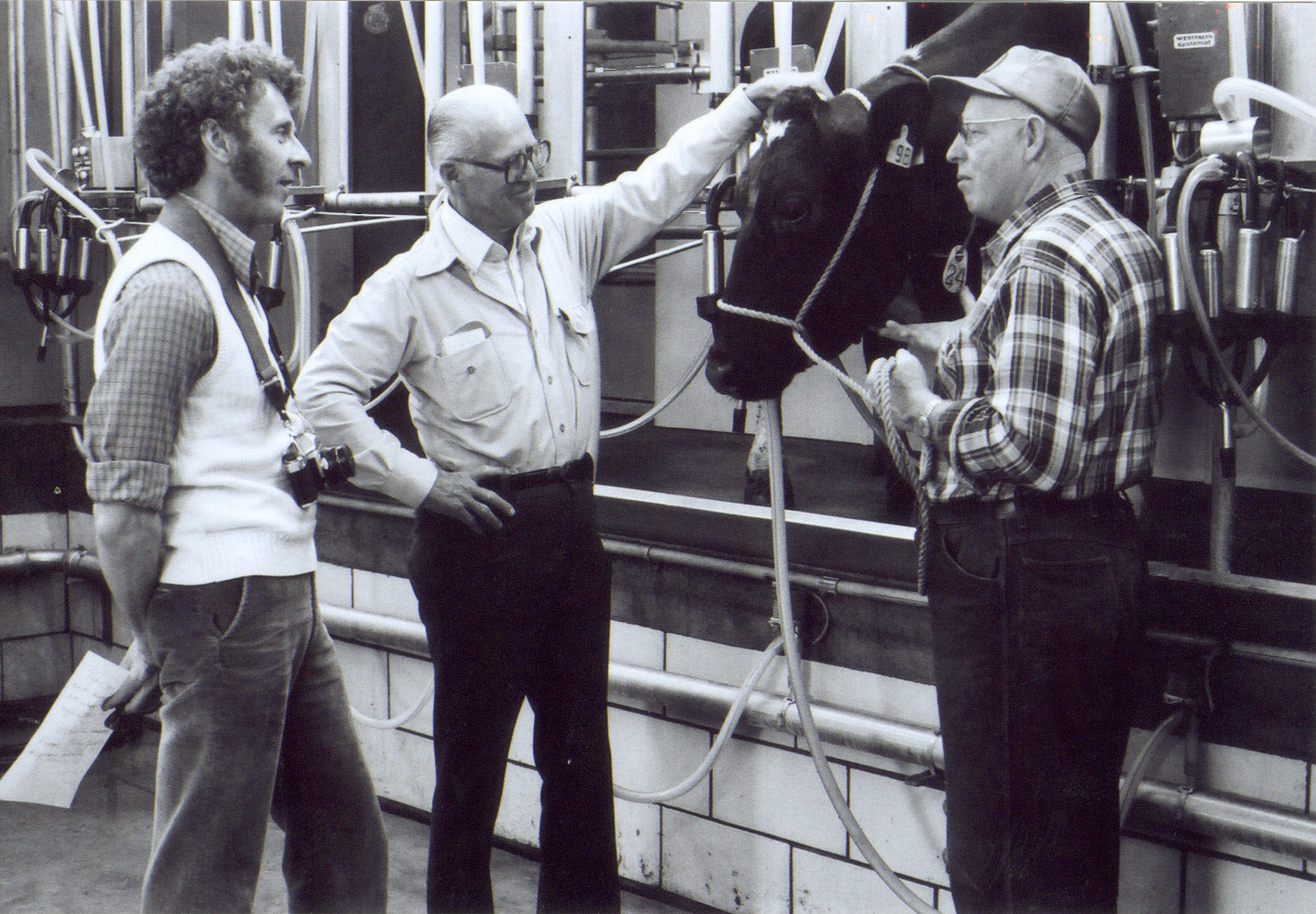A horse eavesdrops on a conversation Bob was having with Norman Borlaug and Bert Warnshuis during the filming of The Pennsylvania Farmer in Erie, PA.