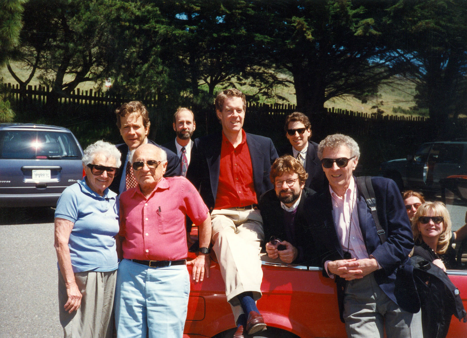 The production team for Race for the Presidency gathers for a photo on a beautiful sunny day in Denver, Colorado. John Andrews, David Asman, Vince Carroll, Bob Chitester, Milton Friedman, Rose Friedman, Morie Kiusalaas, Clifford May, Debra Saunders, Phil Weinstein. 1995.