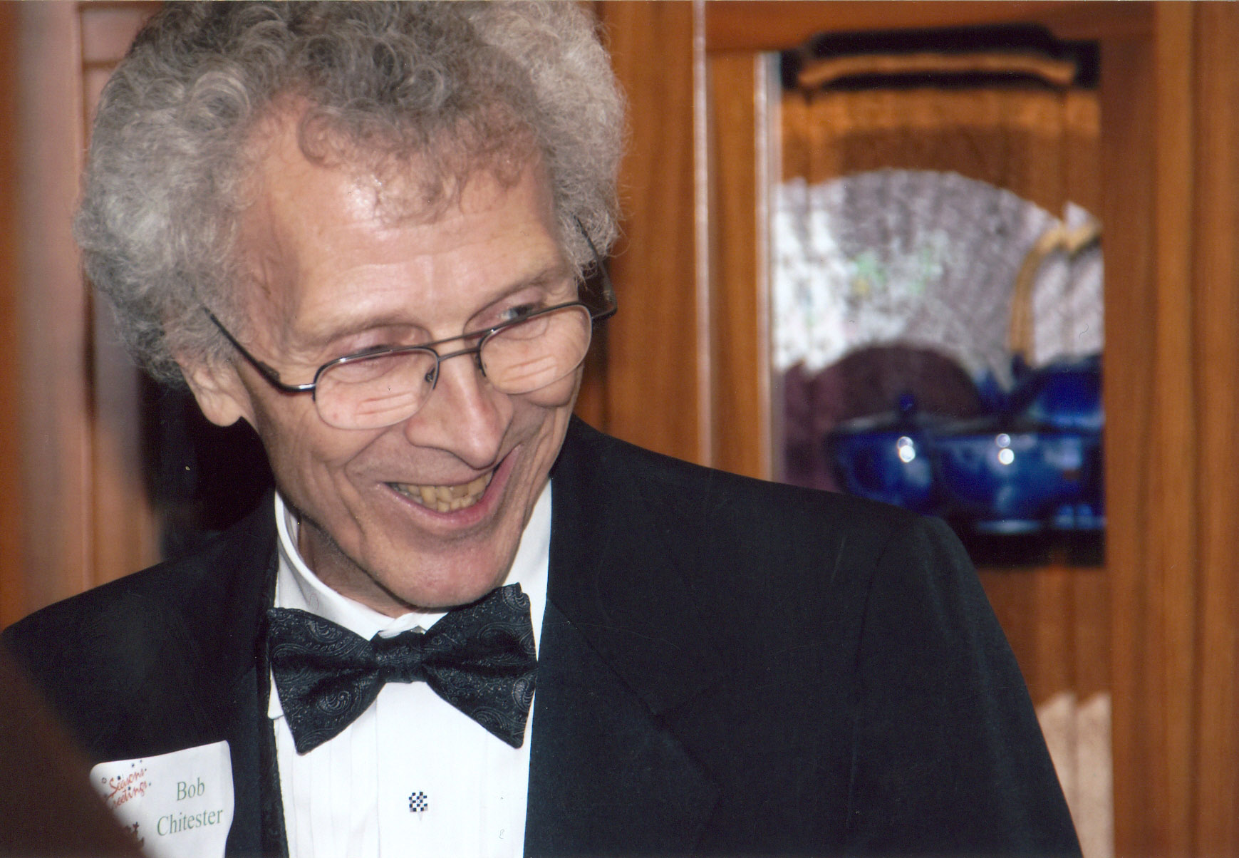 Well-dressed man, Bob Chitester, at Board member Chris Rufer's 2008 Christmas party.