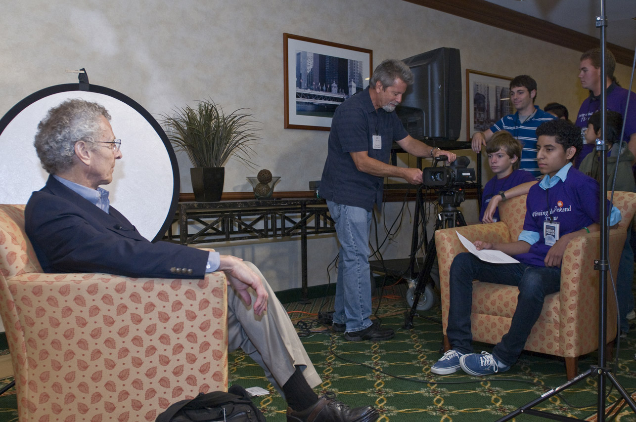Producer Jim Taylor prepares to film an interview between Bob Chitester and a student during the 2009 Winning Ideas Weekend.