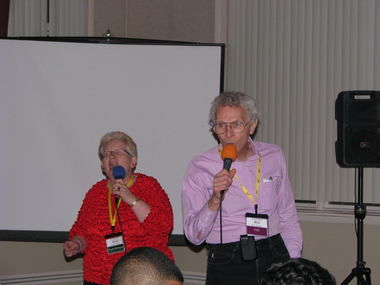 What would a meeting with Bob be without singing? He is joined in song here by Teacher Hazel Johnston at the 2012 Winning Ideas Weekend.