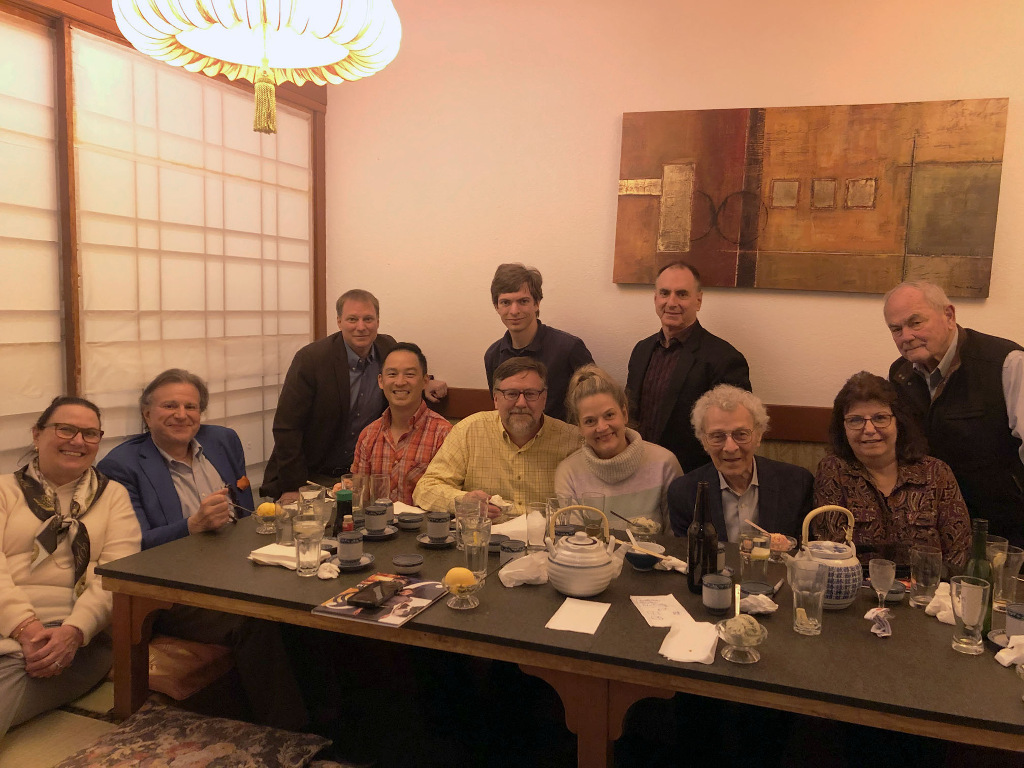If it was up to Bob, every meal would be some version of Asian cuisine...and sitting on the floor. Pictured right to left: Fritz Maytag (in back), Tara Schupp, Bob Chitester, John Chisholm (in back), Tawni Ferrarini, Howard Wall, Eric Miller (in back), Chris Cheng, Rob Chatfield, Tom Hazlett, and Beverly Maytag. January 2020.