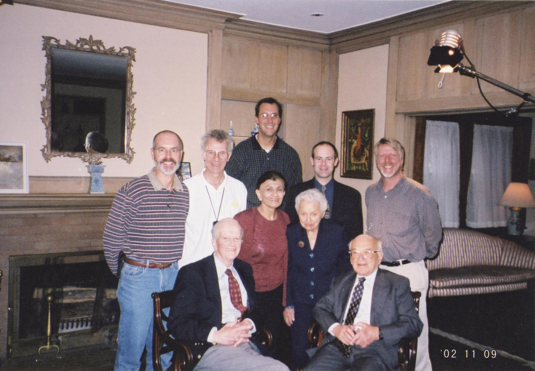(Right to left in front) Milton Friedman, Gary Becker, Rose Friedman, Guilty Nashat, (Left to right in back) Lou Richards, Bob Chitester, Stan Zltokowski, Michael Brown, Todd Brooks during a film shoot for the Liberty Fund.