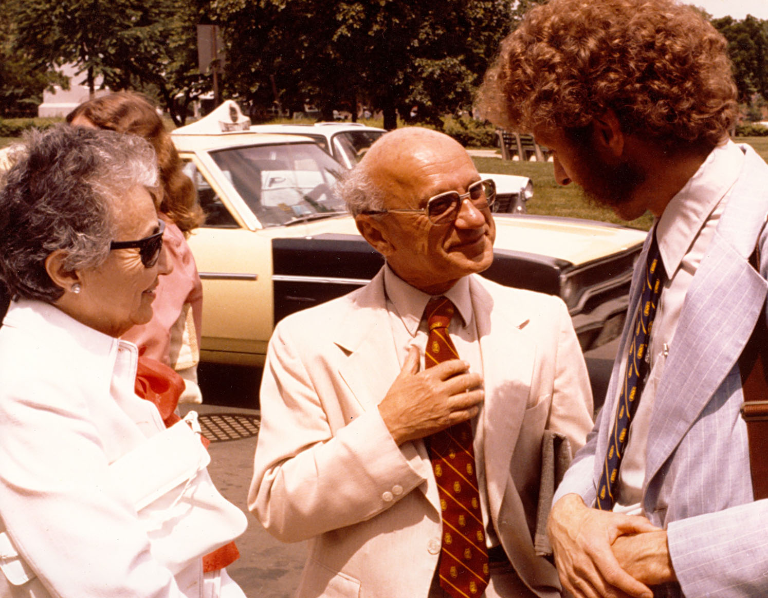 Milton and Rose Friedman have a conversation with Bob's sideburns.