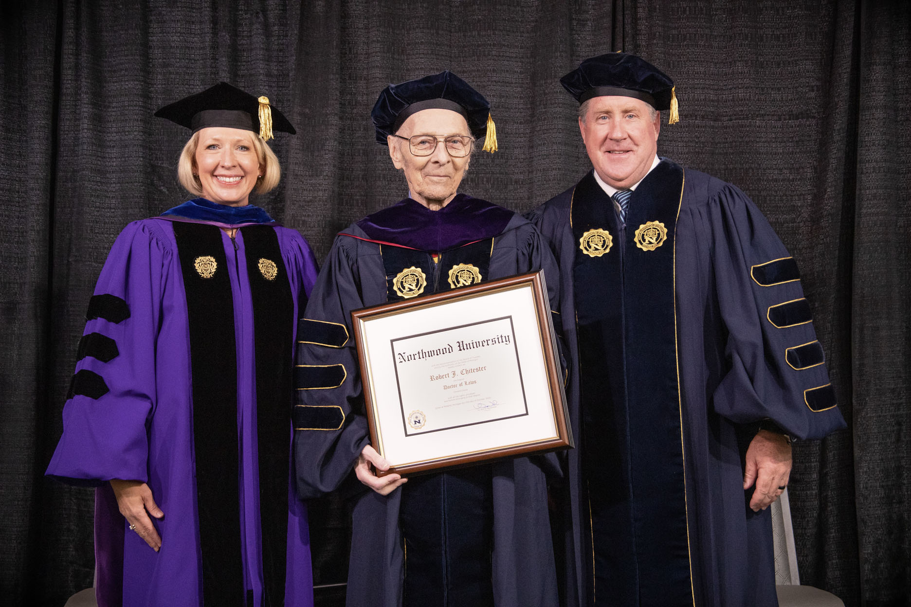 Bob receives his Doctor of Laws Honoris Causa from Kristin Stehouwer, Ph.D., Academic Vice President & Provost, and Dr. Kent MacDonald, President of Northwood University.